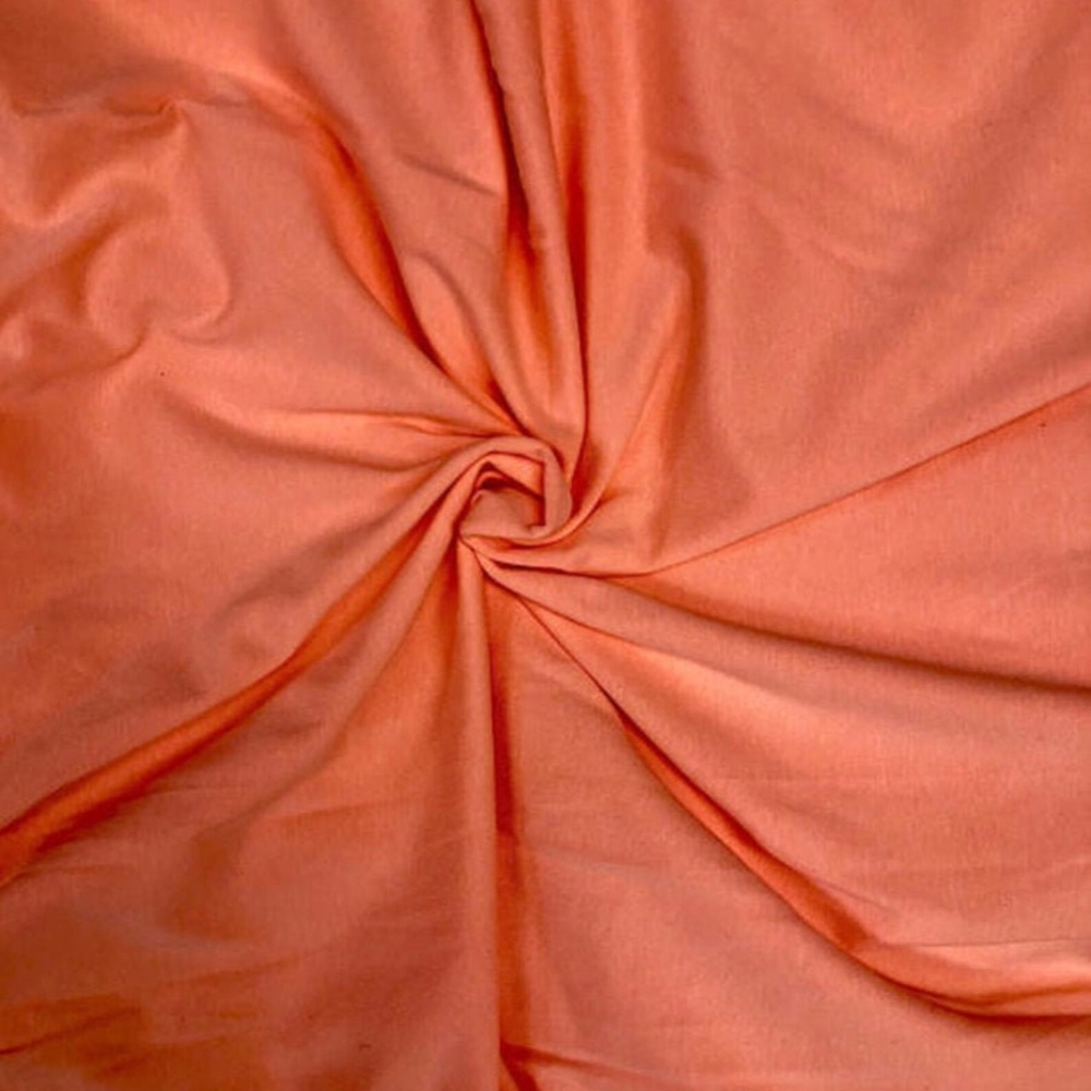 2 yards of peach/coral jersey knit, 95% cotton, 56 inches wide, 4-way stretch